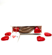 ‘Kiss me’ caramel chocolate lips and hearts.
